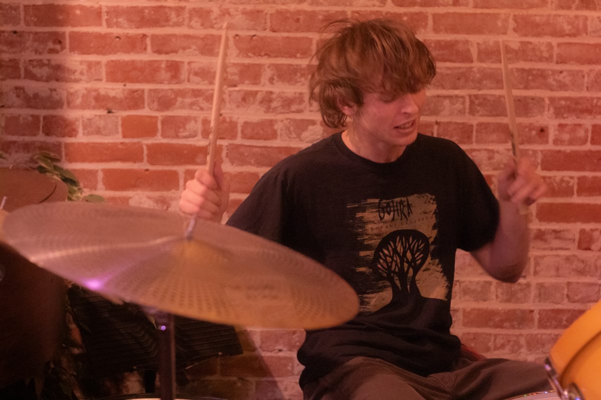 Orangepit's drummer Lucas Herzog gets into the groove during their gig at Wylde Works on Feb. 22 in Santa Barbara, Calif. Herzog dabbles in both drums in Orangepit, and guitar another Santa Barbara local band, called Kid Ok.