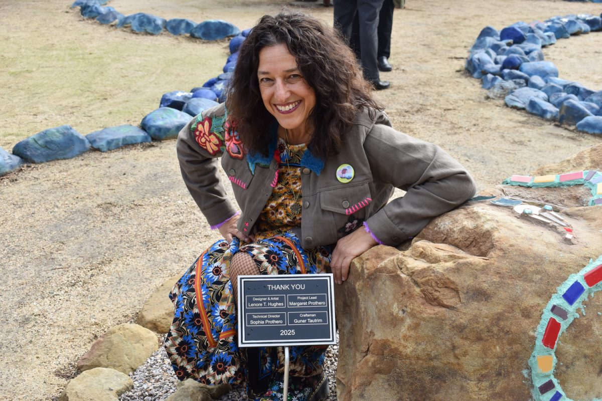 Margaret Prothero, the project lead, pictured with the thank you sign in the Path Maze on Feb. 7, at City College's East Campus in Santa Barbara, Calif. Prothero is the Guided Pathways faculty coordinator, who organized the maze to represent the program.