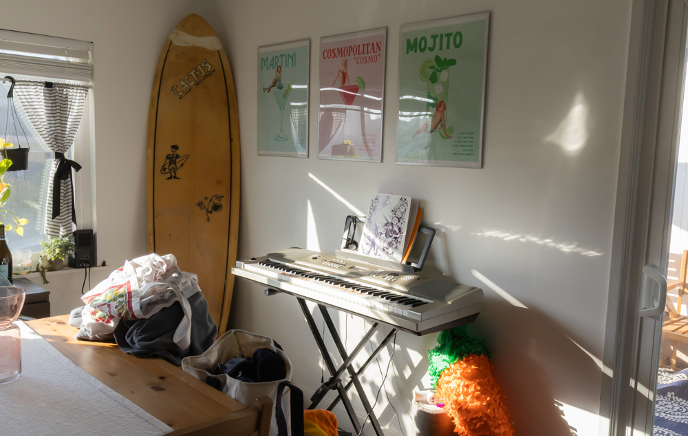 Smith’s piano sits in the corner of the shared living room April 19 in Santa Barbara, Calif. She first started playing the instrument at 16 and has since learned to play pieces by artists such as C418 and Phoebe Bridgers.