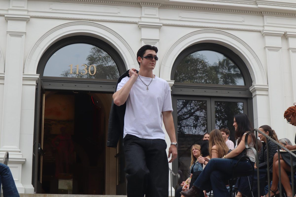 Student Maximus Kislig flaunts his outfit on May 1 at the fashion show "A Look Through Time" at the Santa Barbara Museum of Art in Santa Barbara, Calif. Kislig is the founder of the clothing brand Kis By Maximus.
