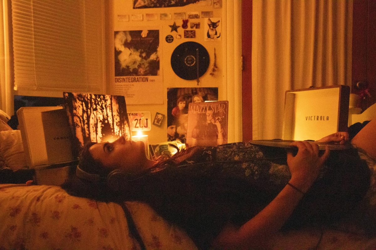 Sylvia Stewart plays "Still" and "So Tonight I Might See" on her record players on May 15 in Santa Barbara, Calif. Stewart has two record players for double the Mazzy.
