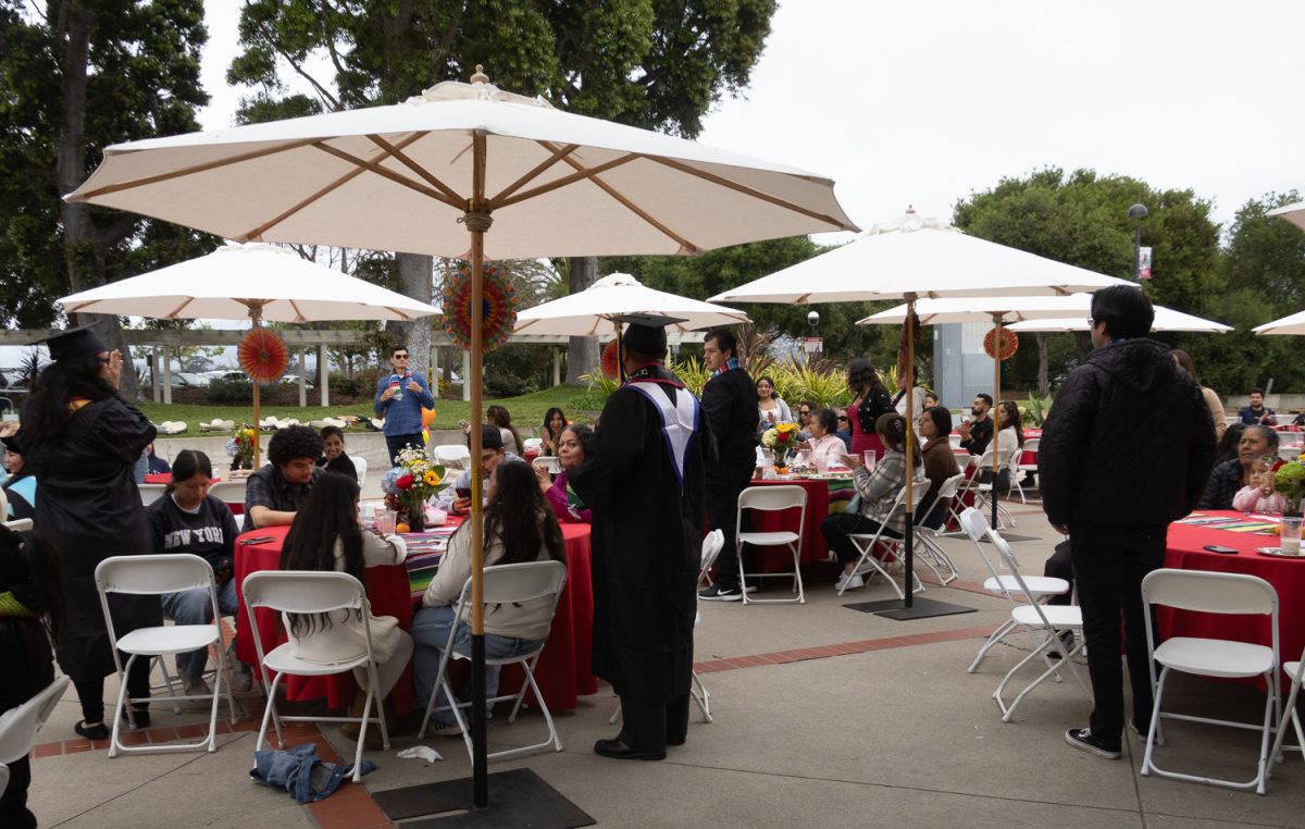 Attends applaud the graduating class of 2025 as they stand May 3 outside City College's Student Services Building in Santa Barbara, Calif. The event marked the first HSI graduation ceremony at City College.